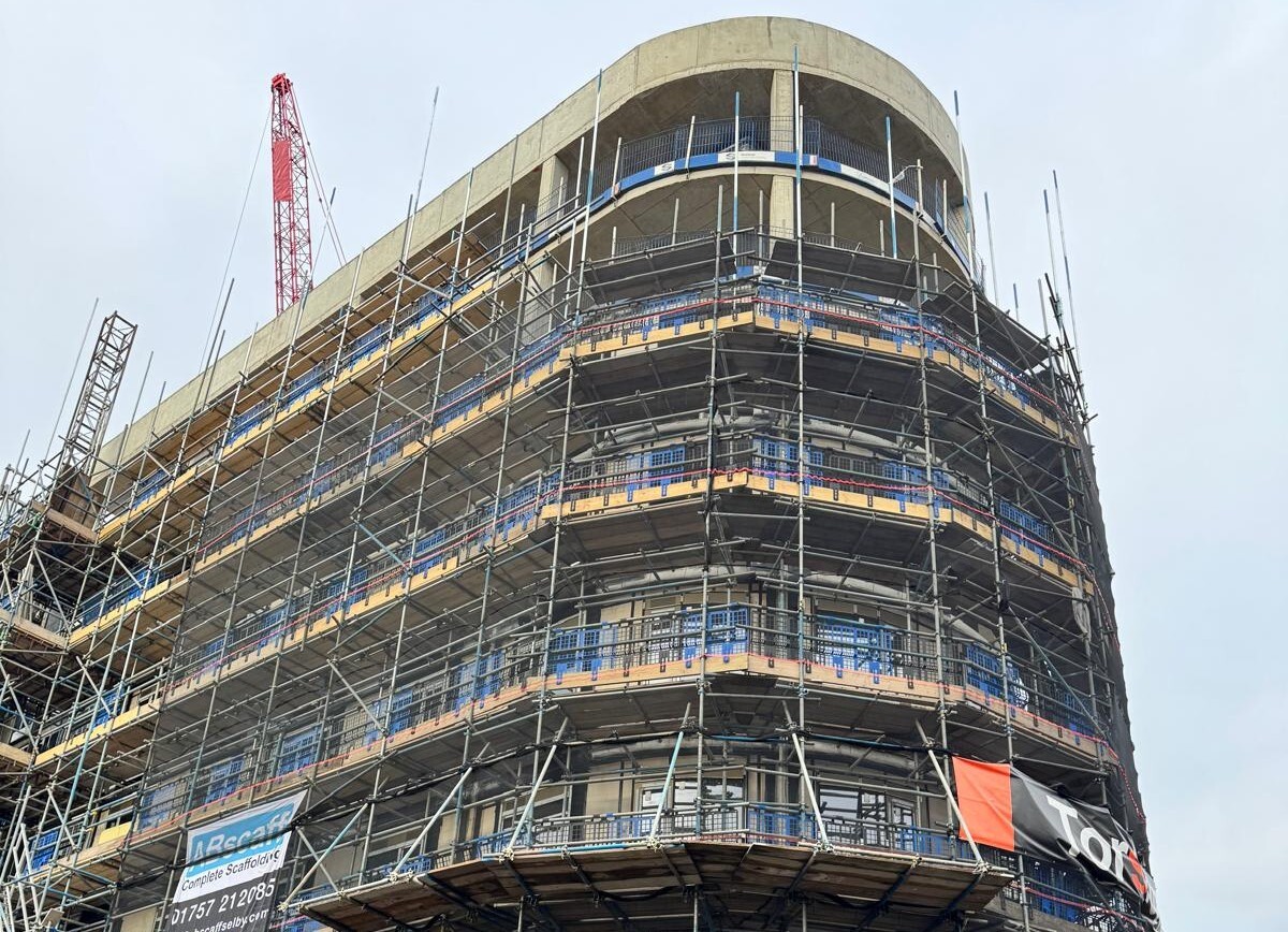 A building in construction where high-rise glazing will be installed.
